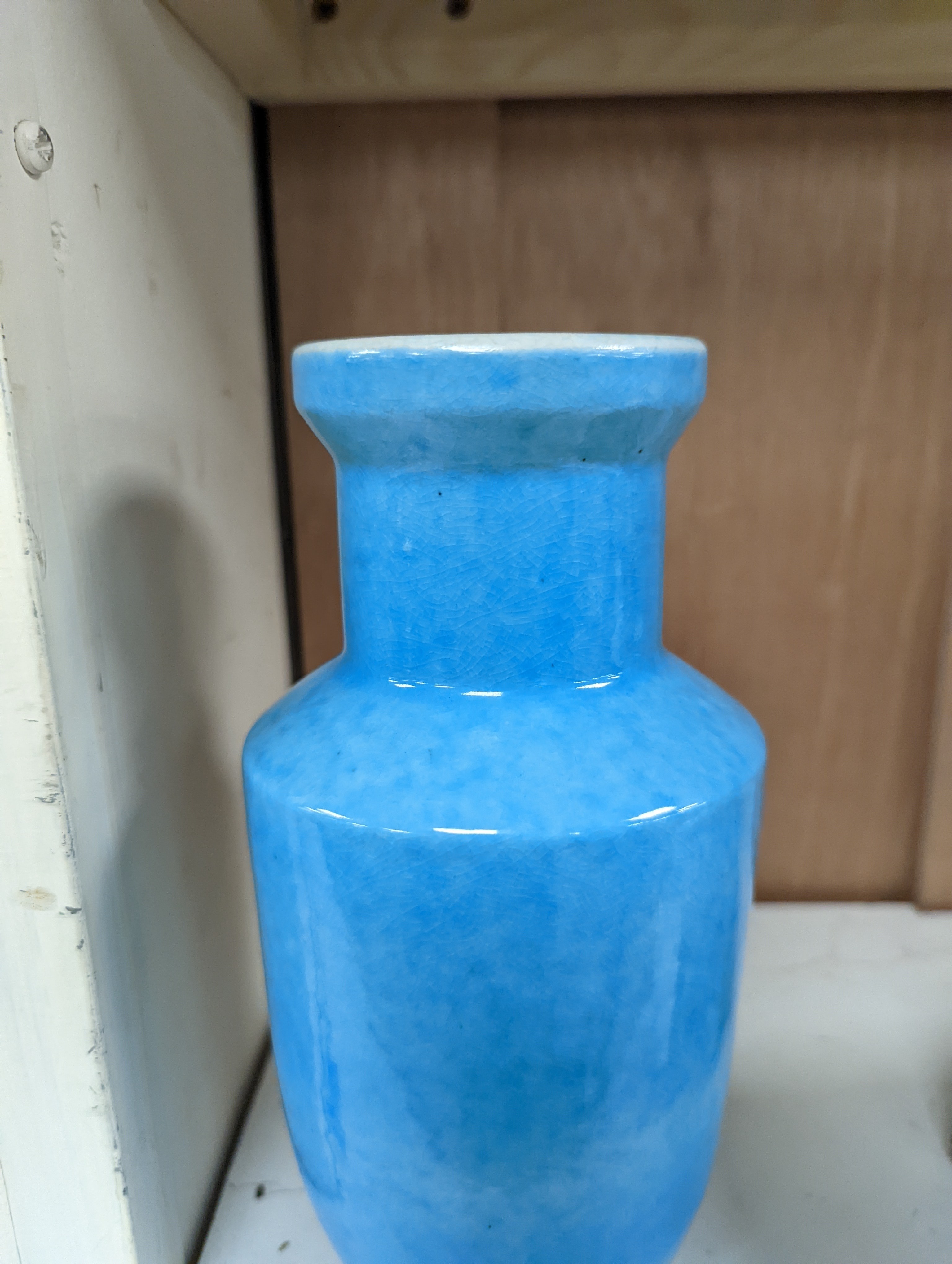 A Chinese turquoise glazed vase 22cm, with a fine crackle to the exterior glaze
